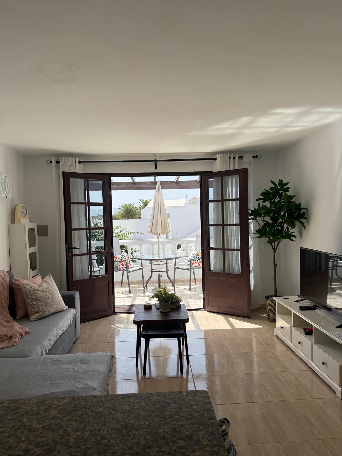 One bed first floor apartment with side sea views